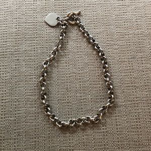 Silver necklace with heart at clasp